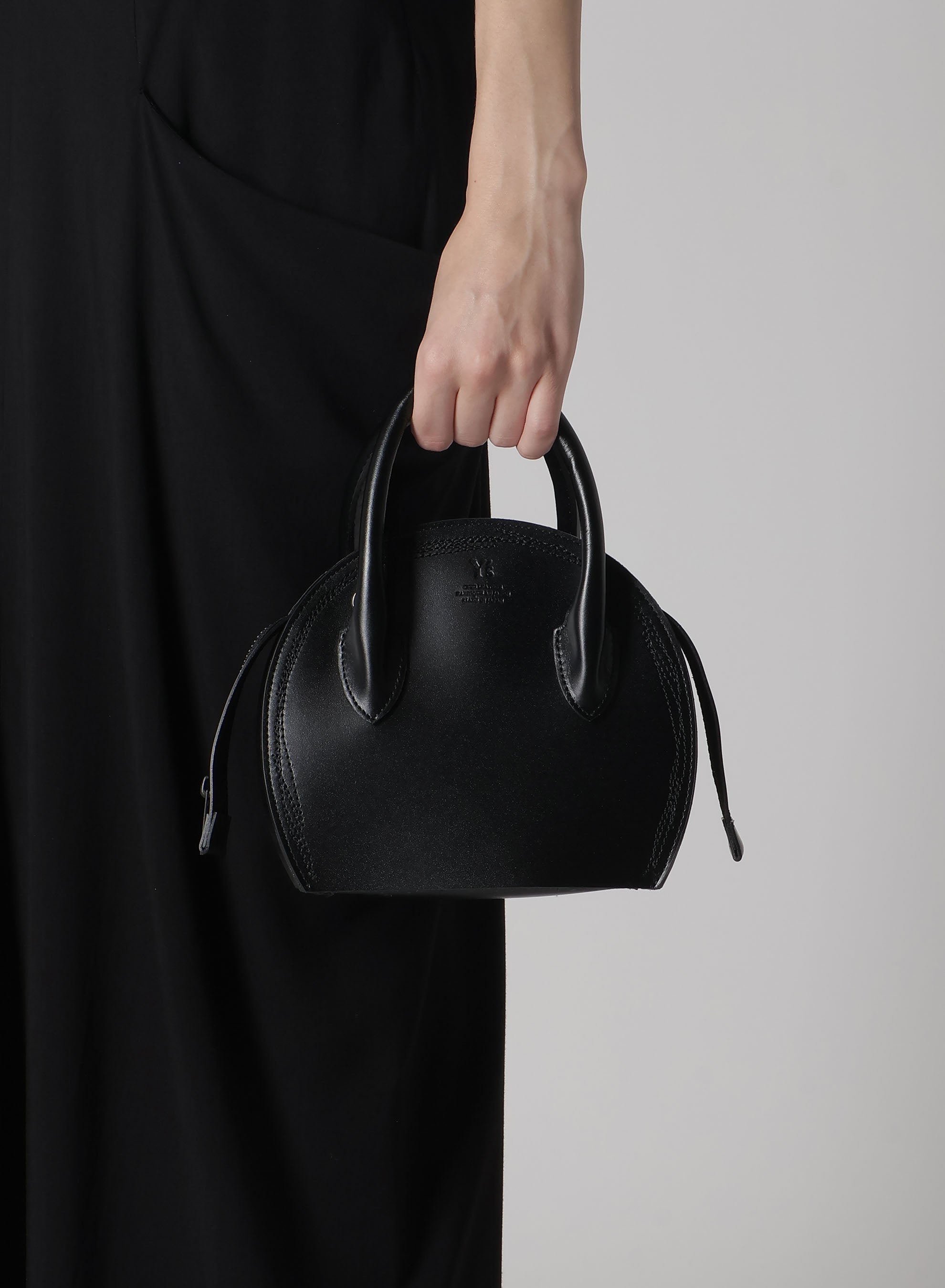 SEMI-GLOSS LEATHER CHOPPED ROUND BAG – THE SHOP YOHJI YAMAMOTO