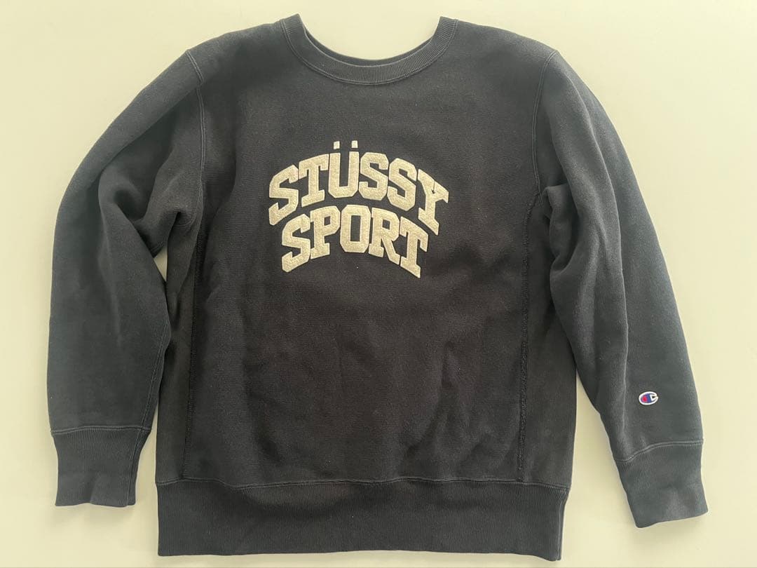 【古着】ステューシー &チャンピオン　リバースウェーブ Lサイズ黒 STUSSY（ステューシー） ×チャンピオン リバースウィーブ フロントロゴ