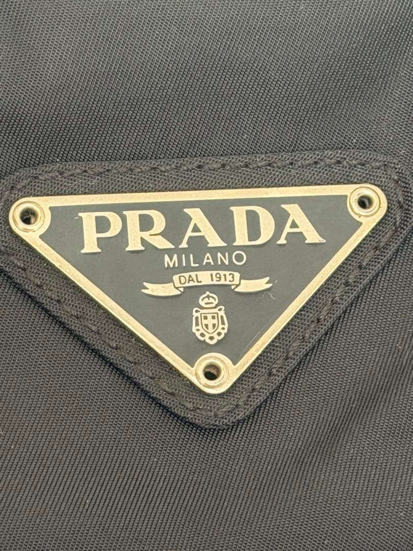 値下げしますね。PRADA 黒 ナイロン トートバッグ 中古USED PRADA トートバッグ ナイロン 三角プレート ロゴ 49173