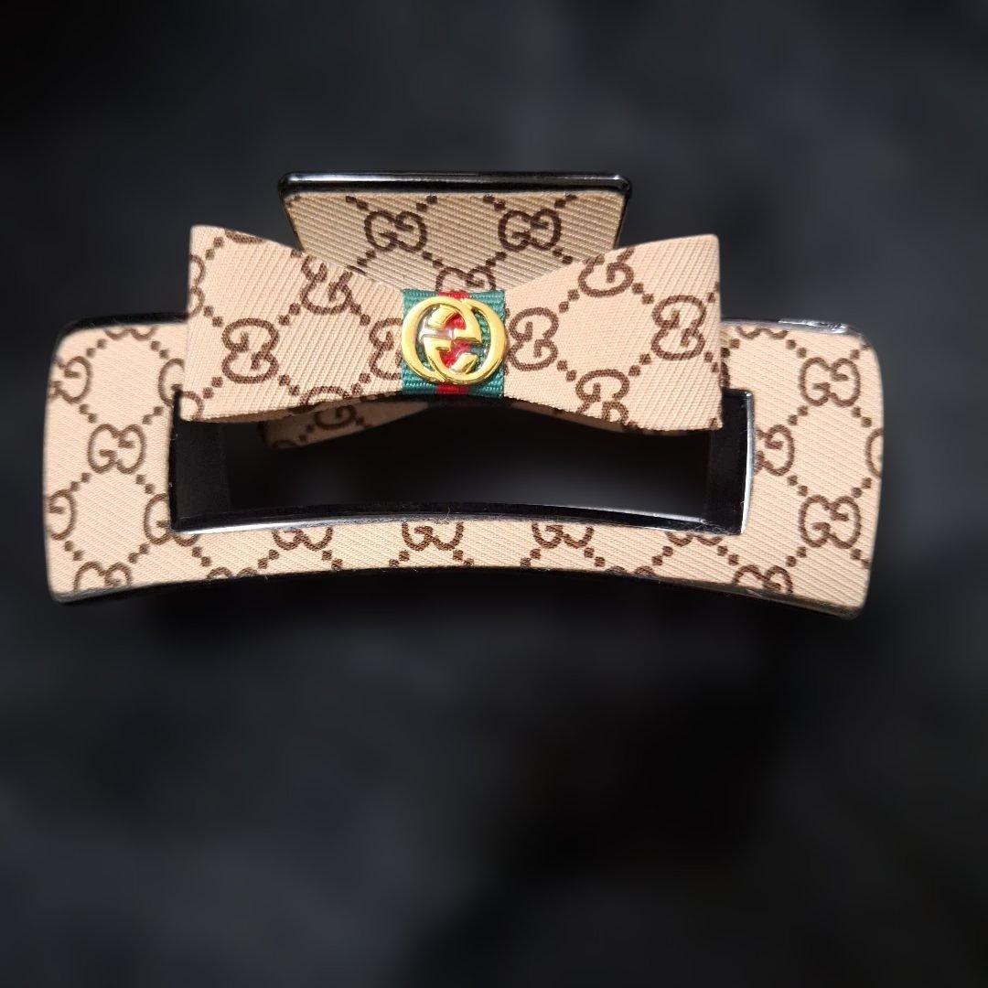 新品❣️激レア GUCCl GGロゴ リボンヘアクリップ ノベルティ グッチ 121270.jpg